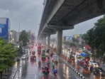 rainy-rush-hour-beneath-the-viaduct-medium